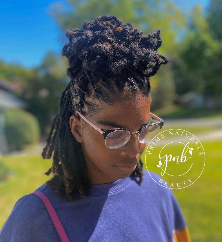 Blooming Loc Petals style . Cute Spring updo dreadlock style. Back of hair is hanging while top portion of hair is pinned up into blooming loc petals. @primenbeauty
